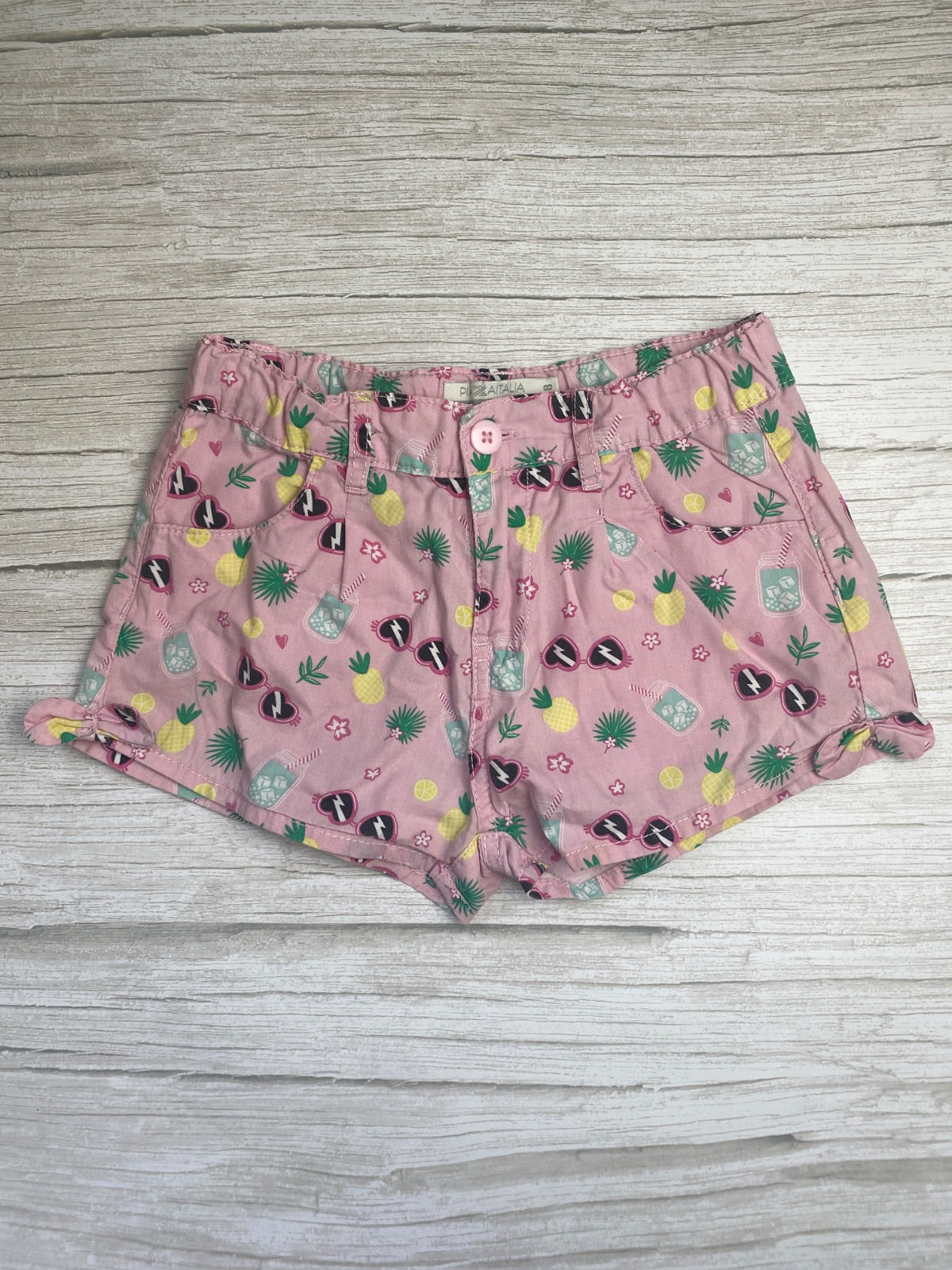 Shorts rosa con stampa estiva