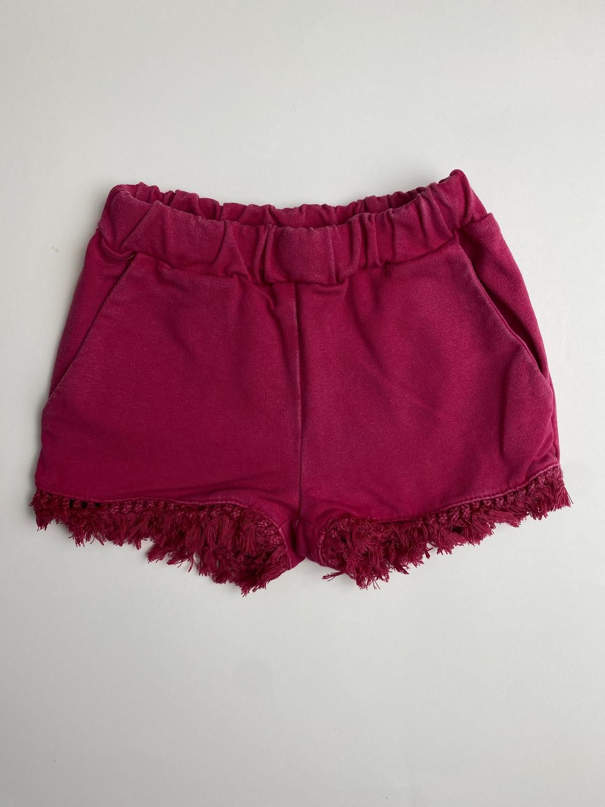 Shorts fucsia con frange e vita elasticizzata