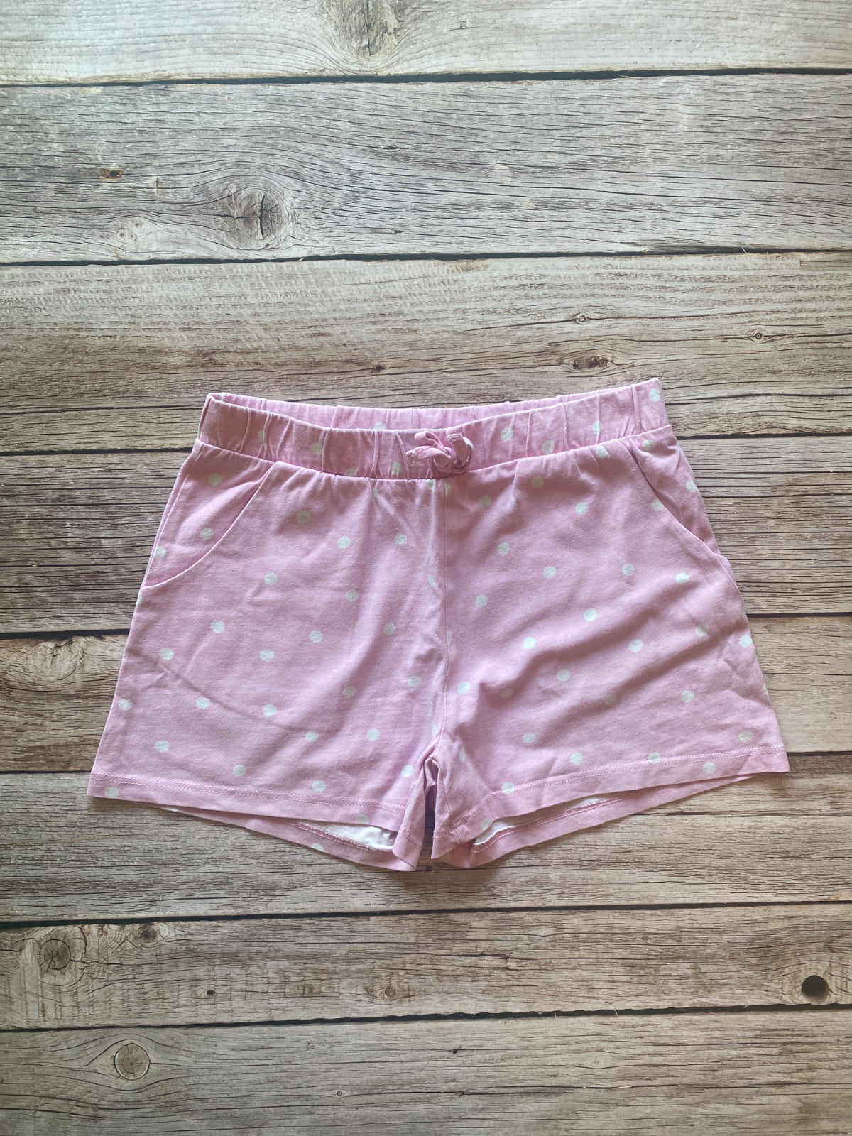 Shorts rosa a pois bianchi per bambina