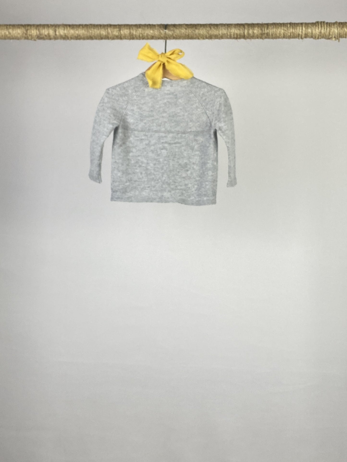 Maglione con bottoncini