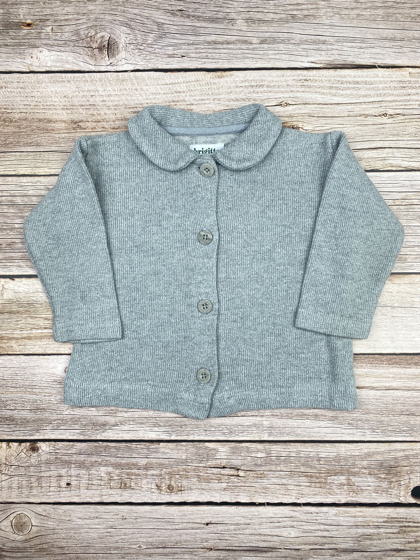 Maglione con bottoni e colletto