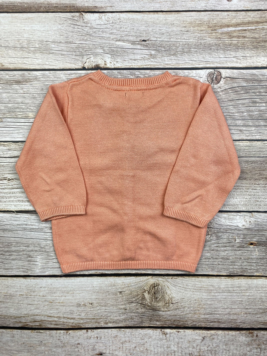 Maglione con bottoncini