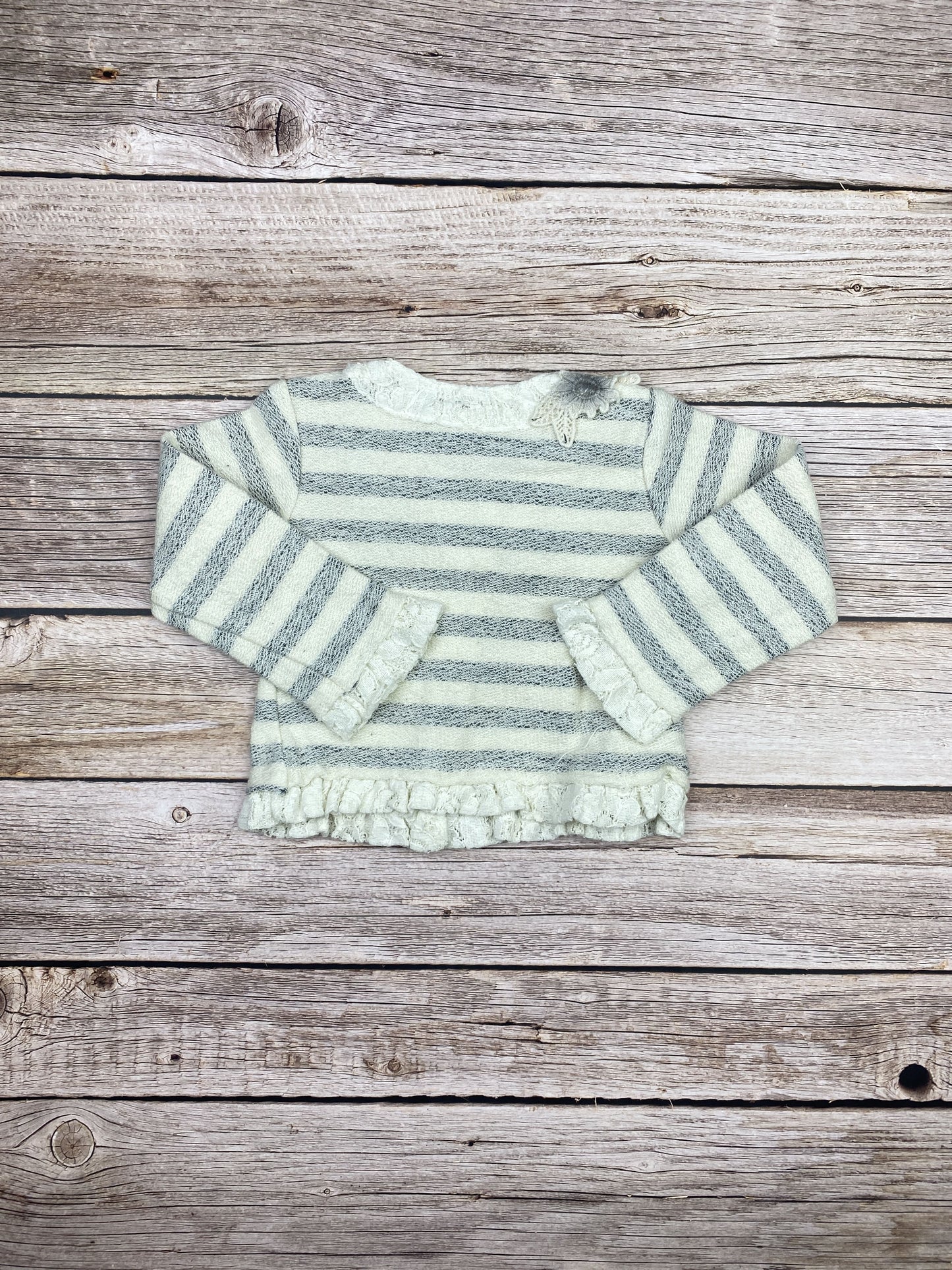 Maglione con bottoncini