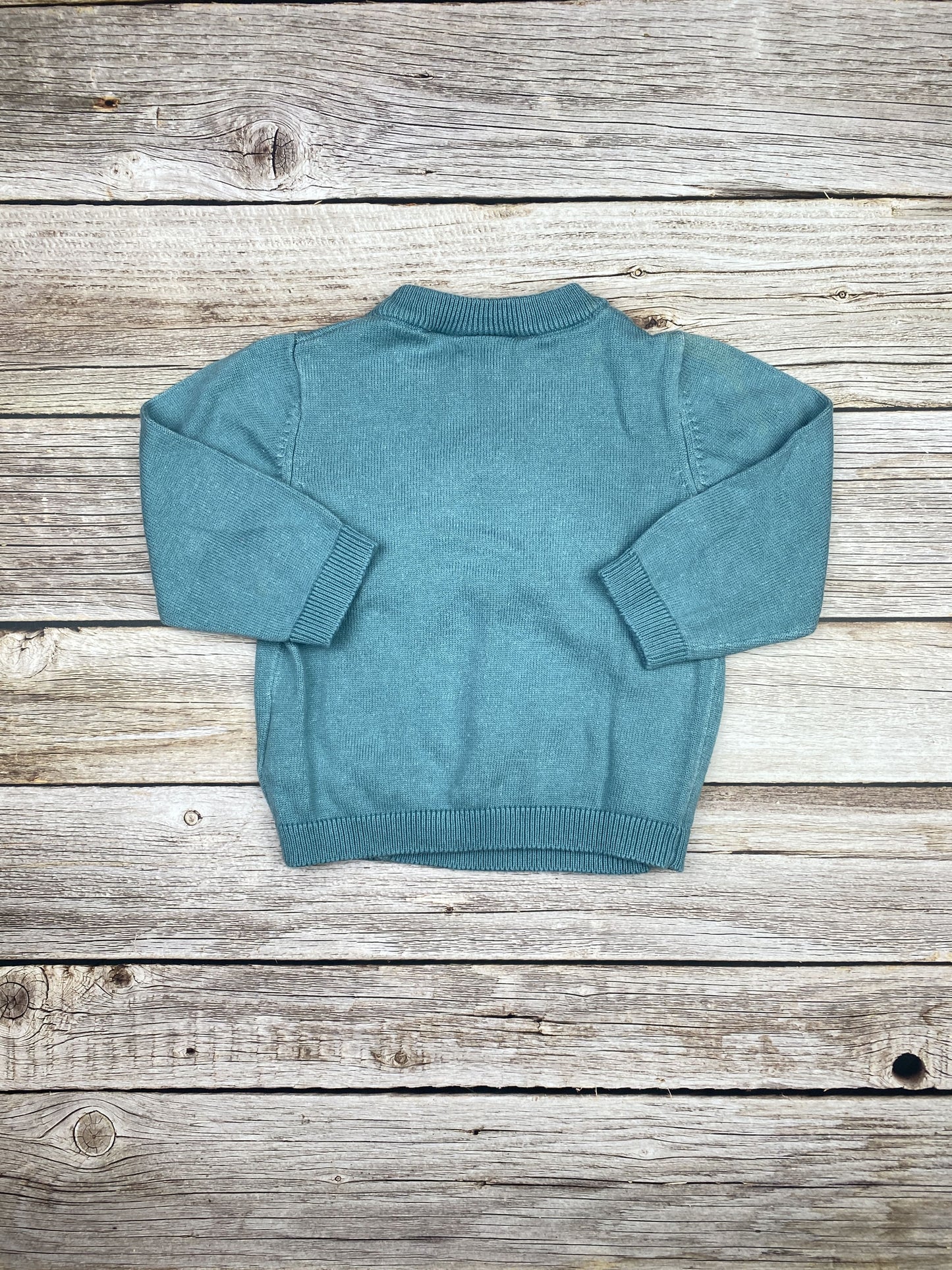 Maglione con bottoncini