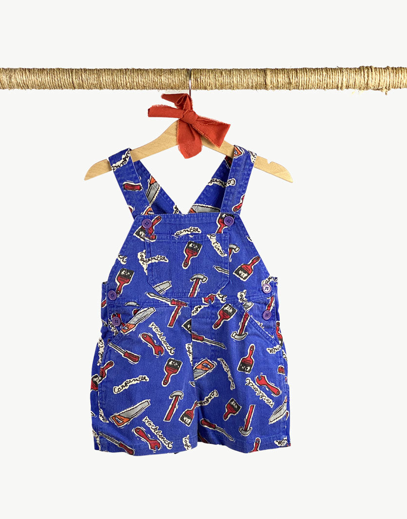 Salopette con pantalone corto