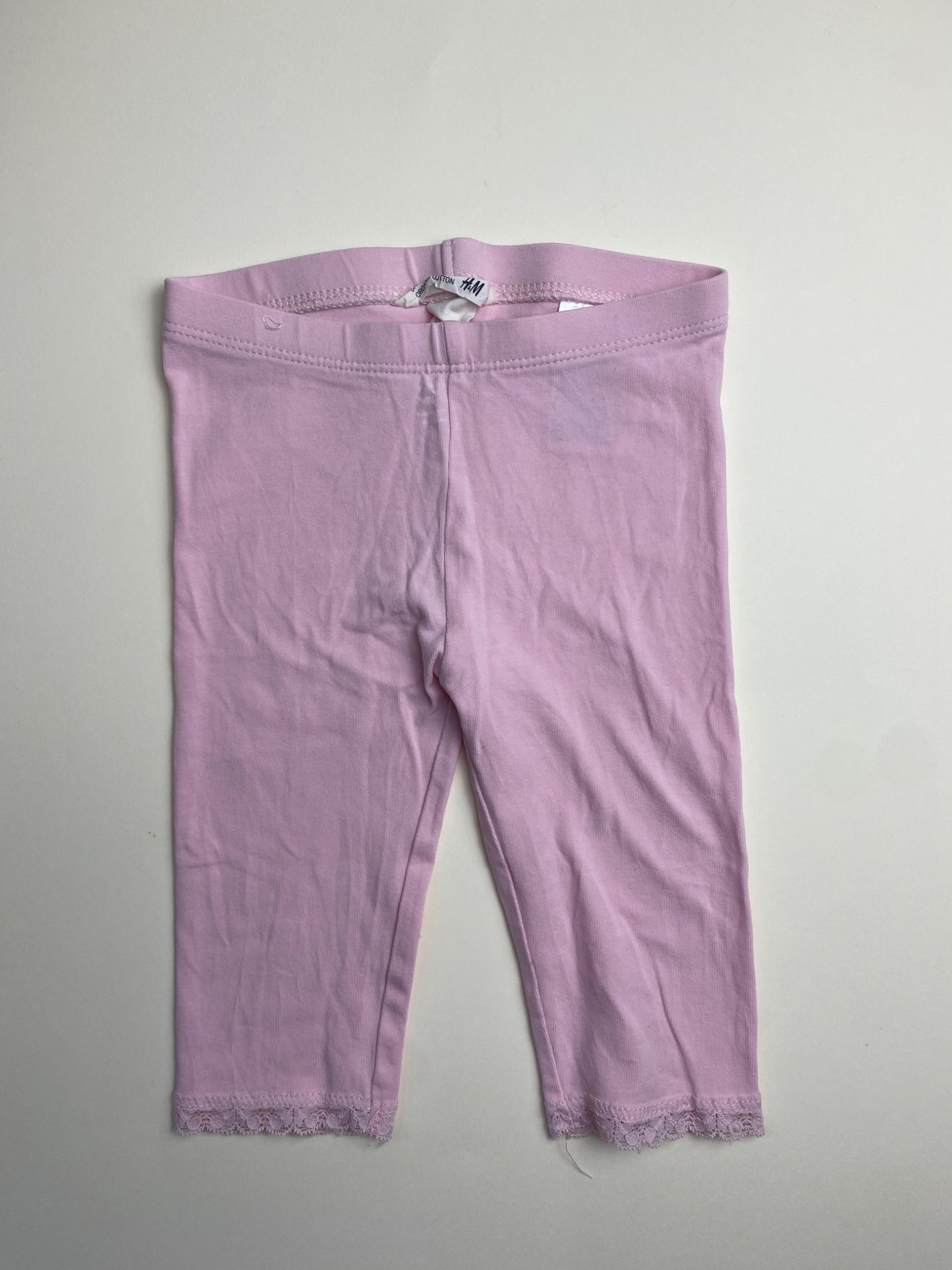Leggings rosa con pizzo