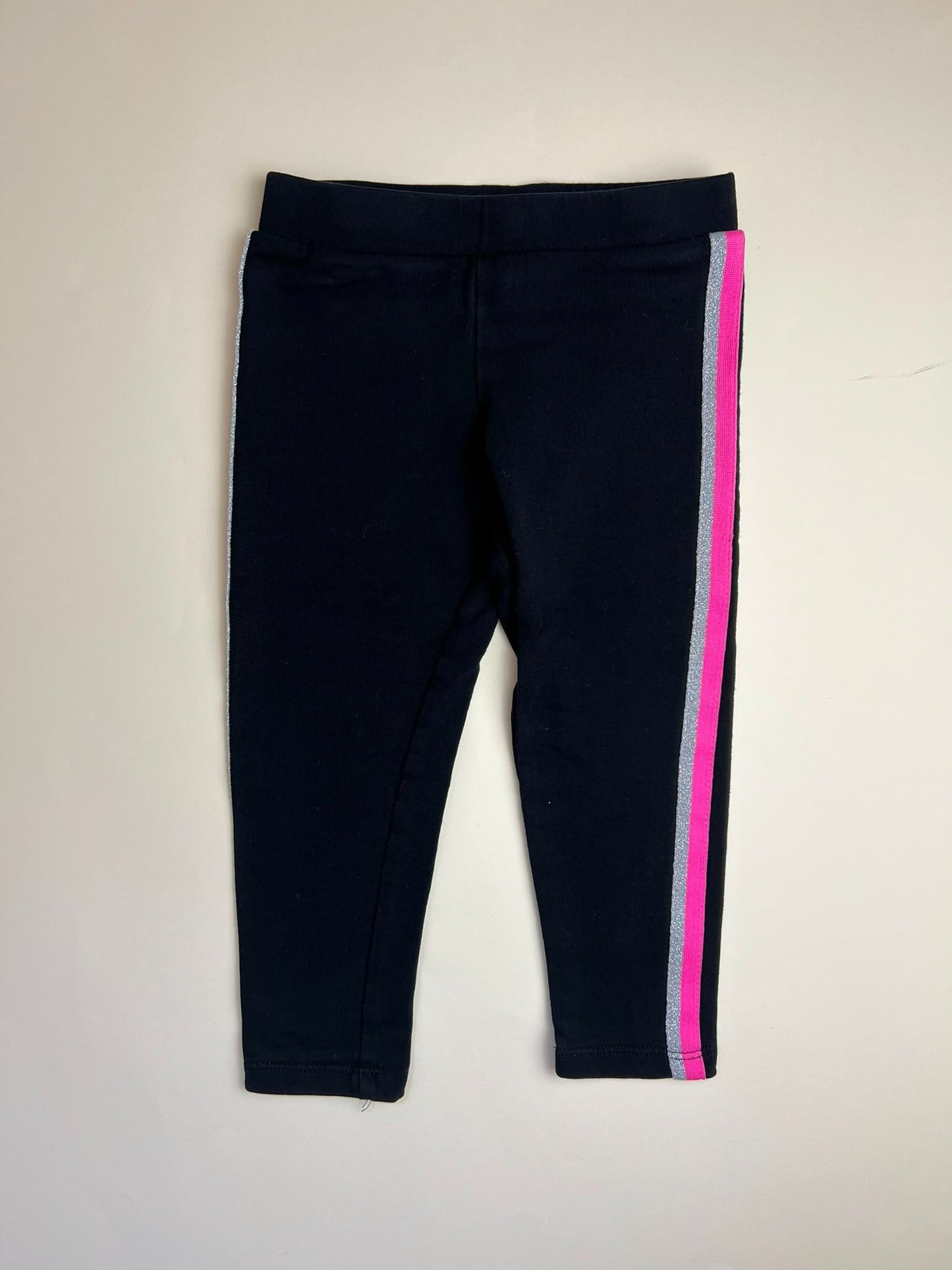 Leggings neri con bande laterali rosa e argento