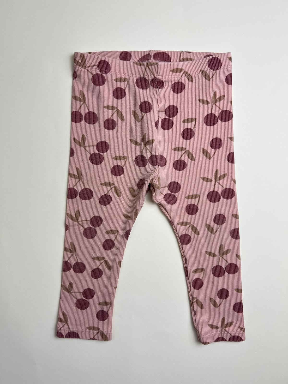 Leggings a costine rosa con fantasia ciliegie