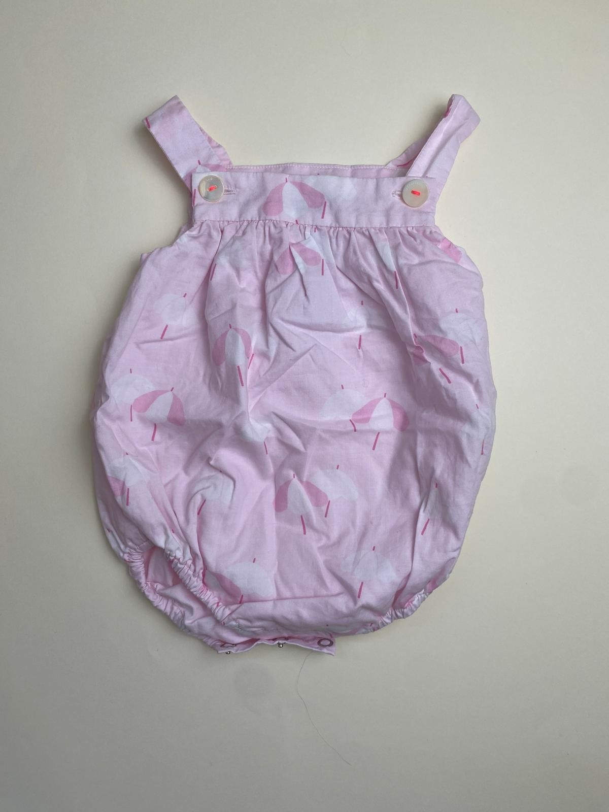 Pagliaccetto neonata rosa con stampa ombrelli