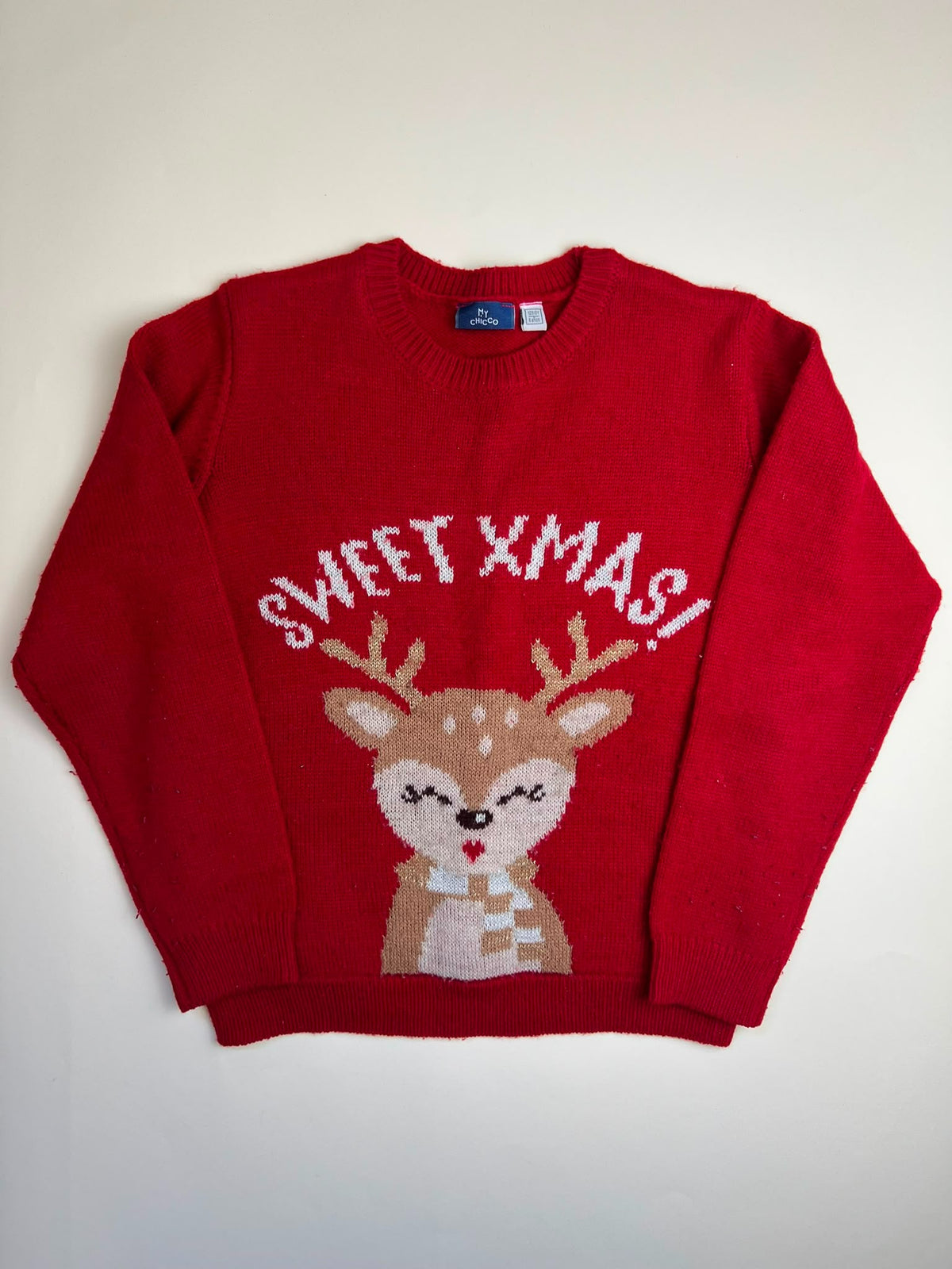 Maglione natalizio rosso con renna e scritta "Sweet Xmas!"