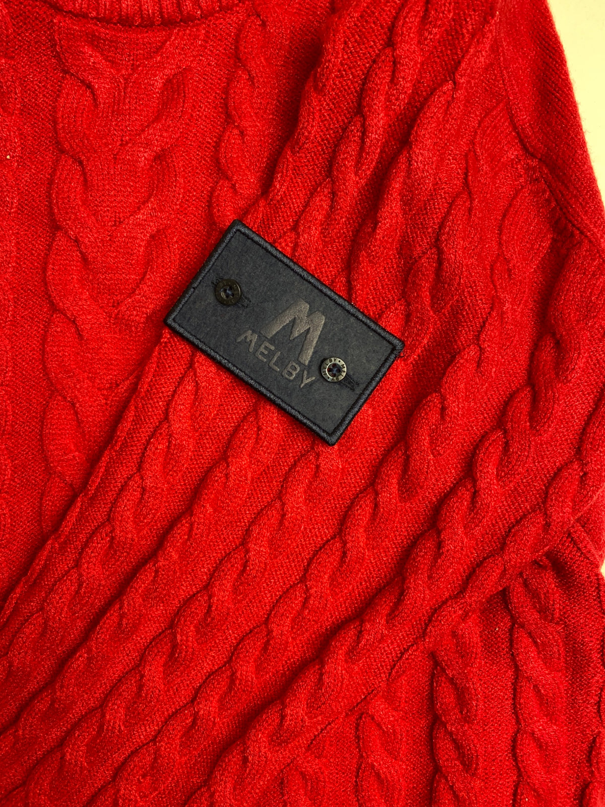 Maglione rosso a trecce Melby