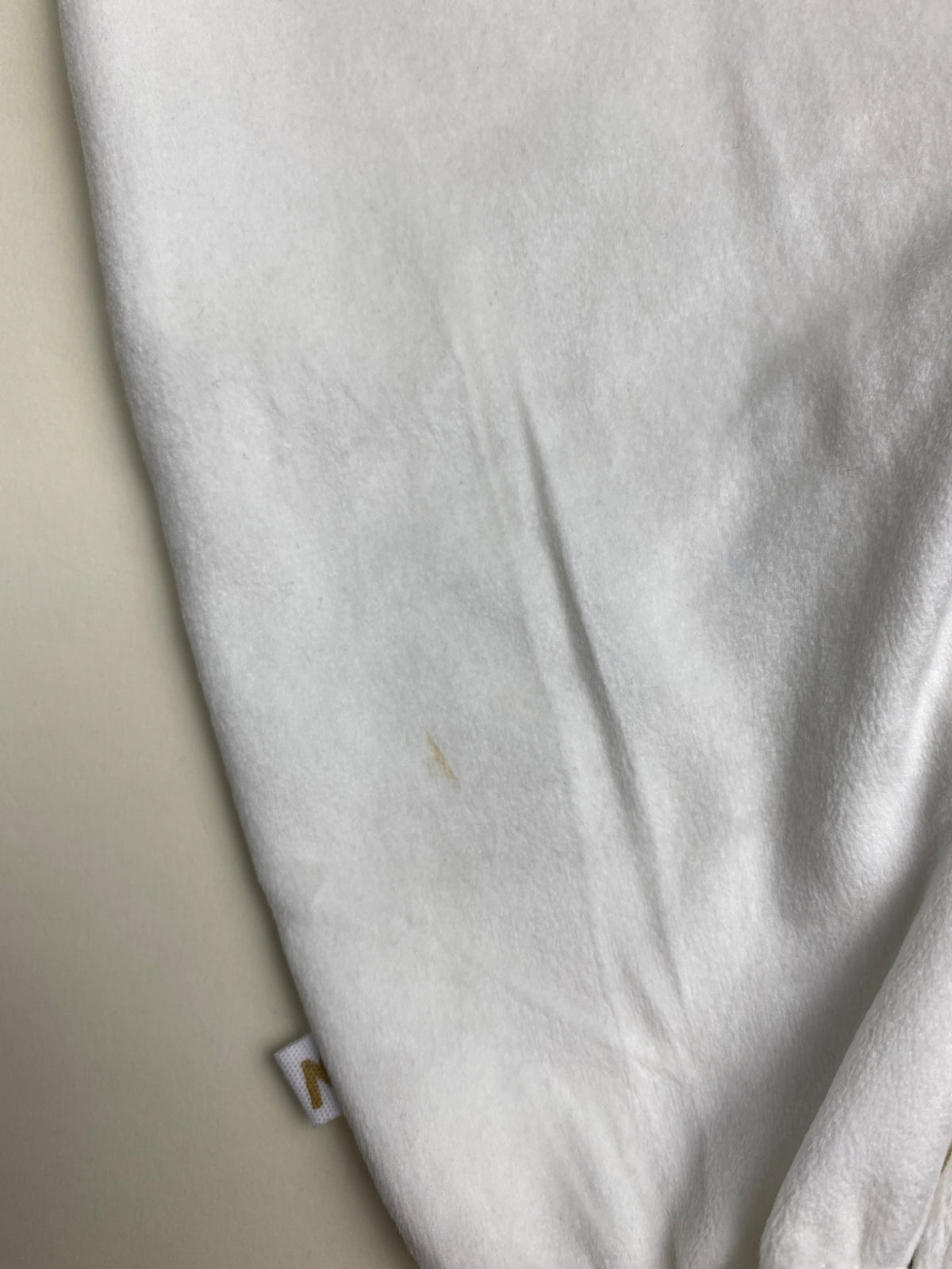 Tutina neonato bianca- piccolissima macchia su retro gamba