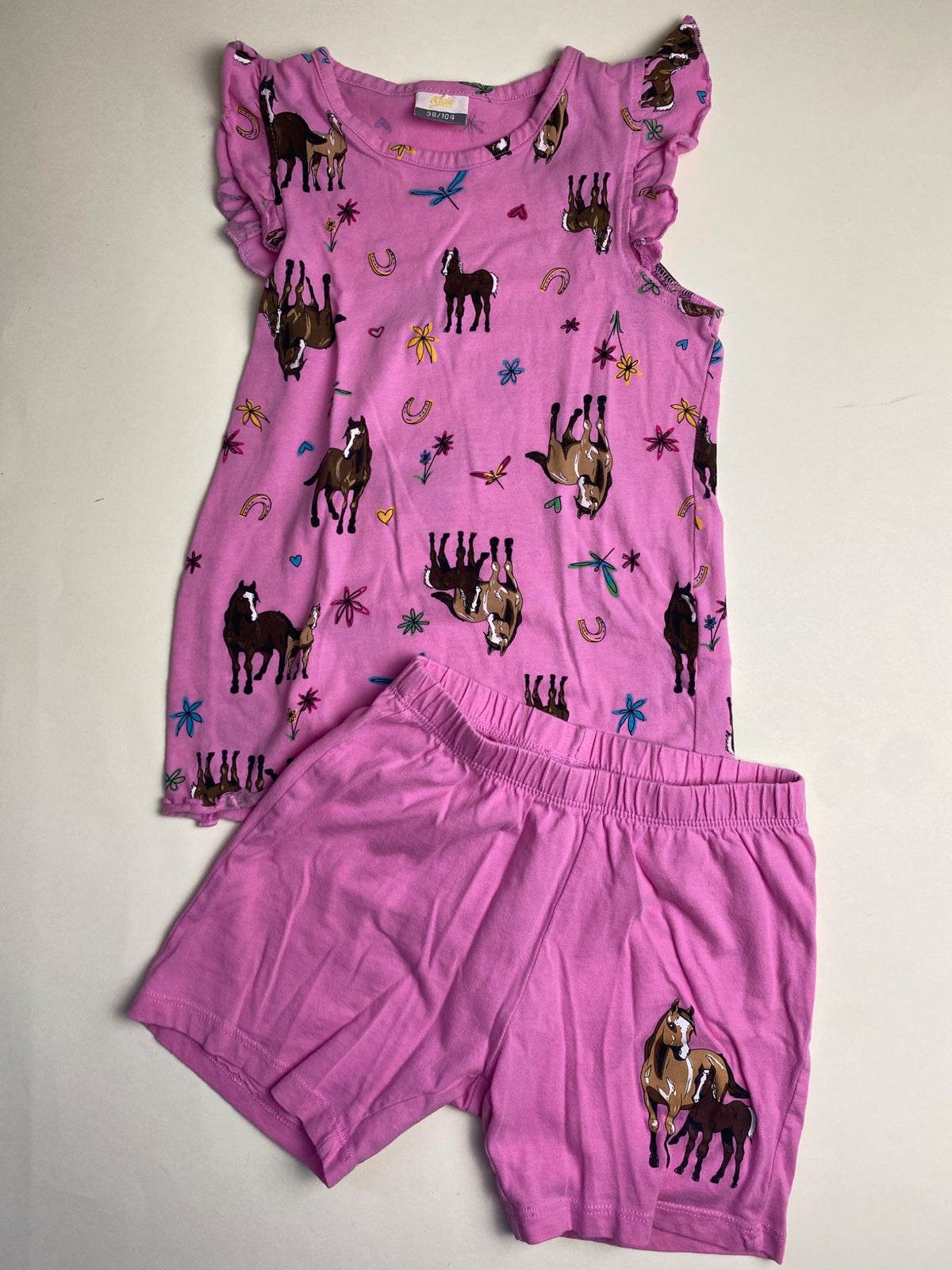 Completo estivo rosa per bambina con stampa cavalli