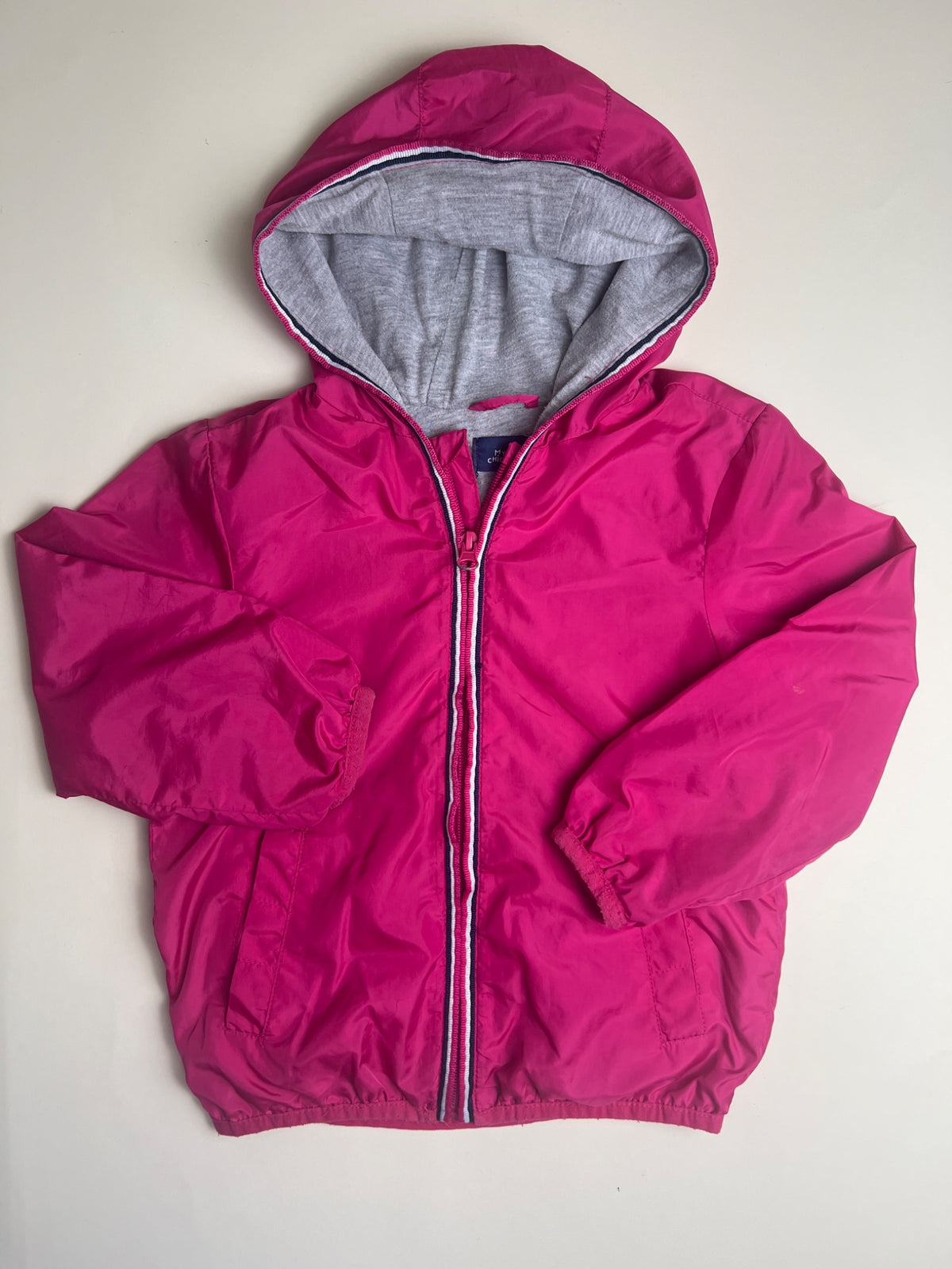 Giacca a vento fucsia con cappuccio