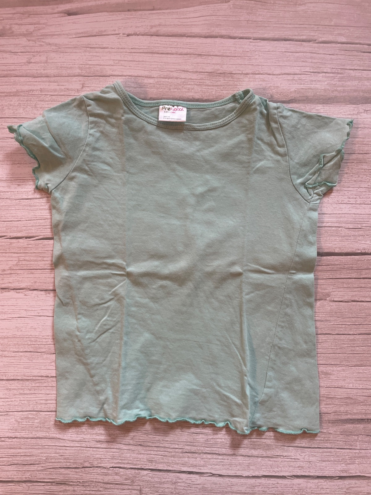 T-shirt Prenatal verde menta con bordi ondulati