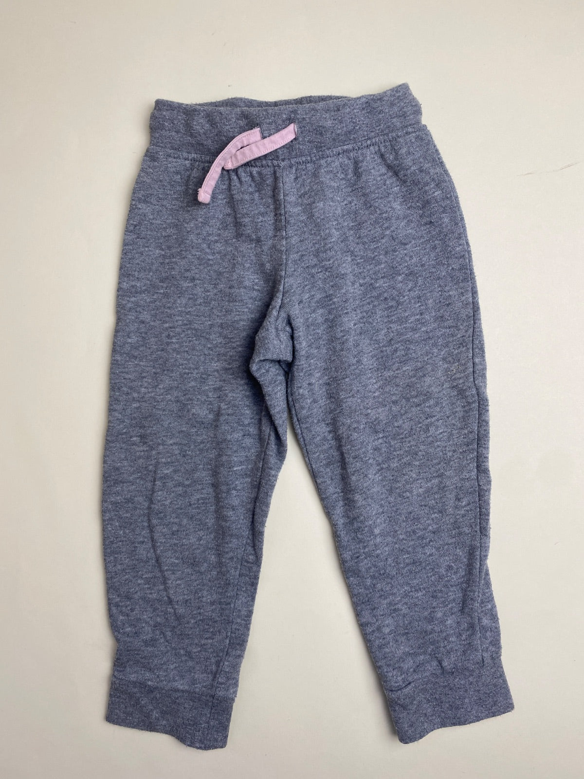Pantaloni sportivi per bambini grigi con coulisse rosa