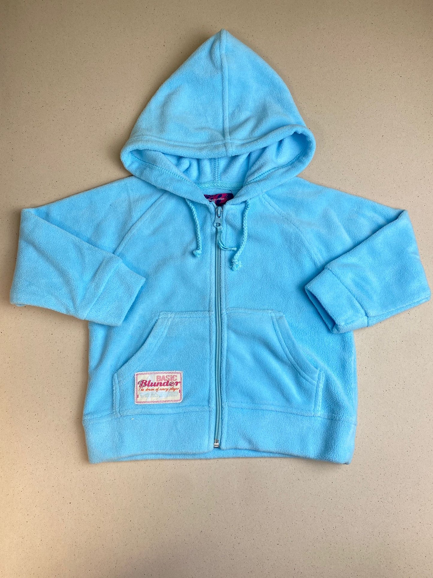 Pile con zip e cappuccio