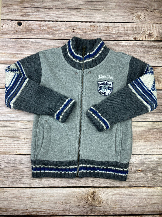 Pile con zip e maniche in maglia