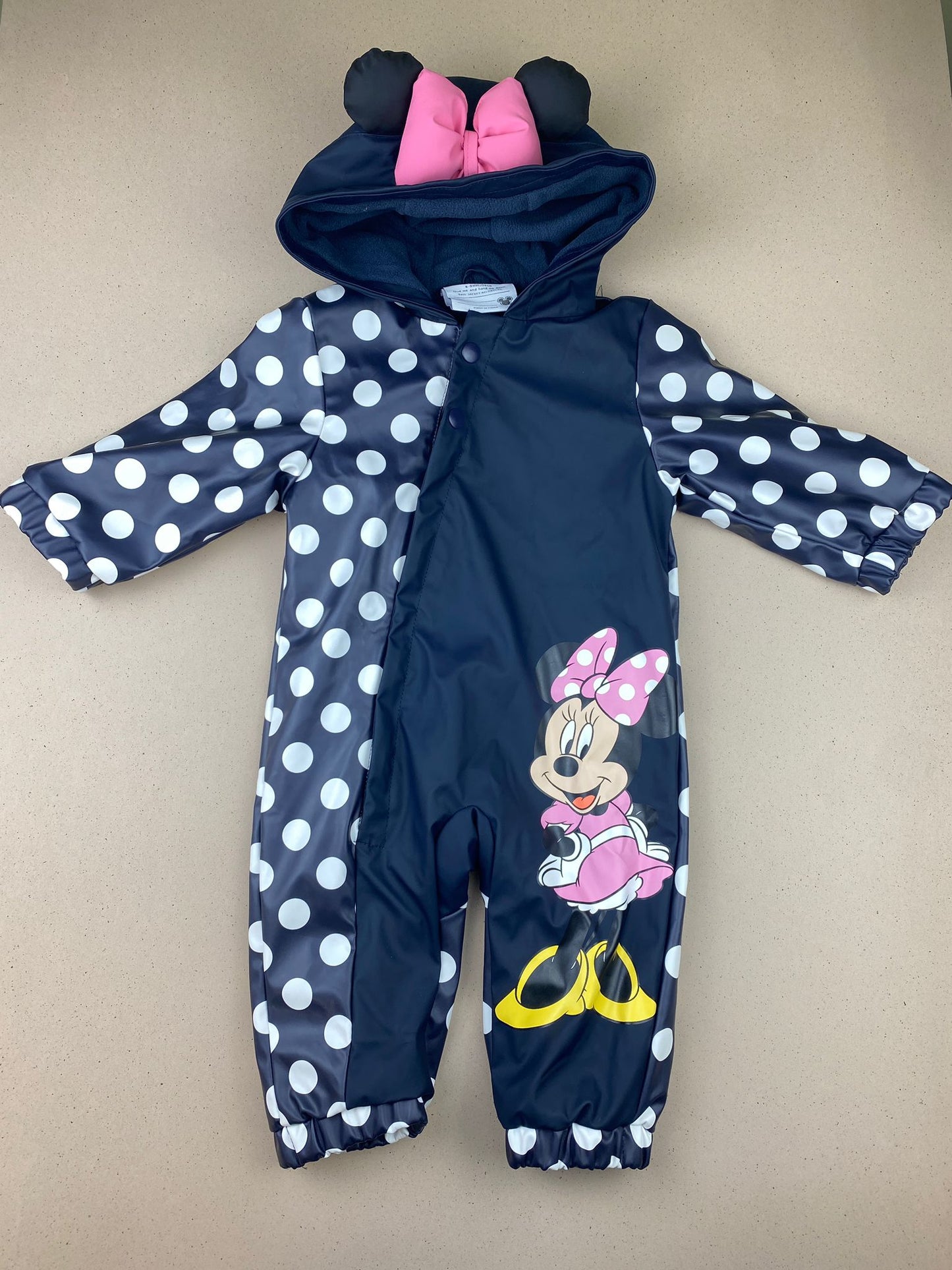 Tutina impermeabile con cappuccio