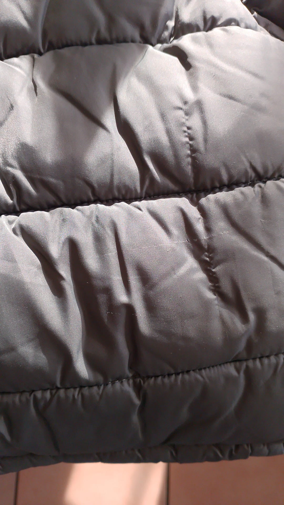 Piumino con cappuccio