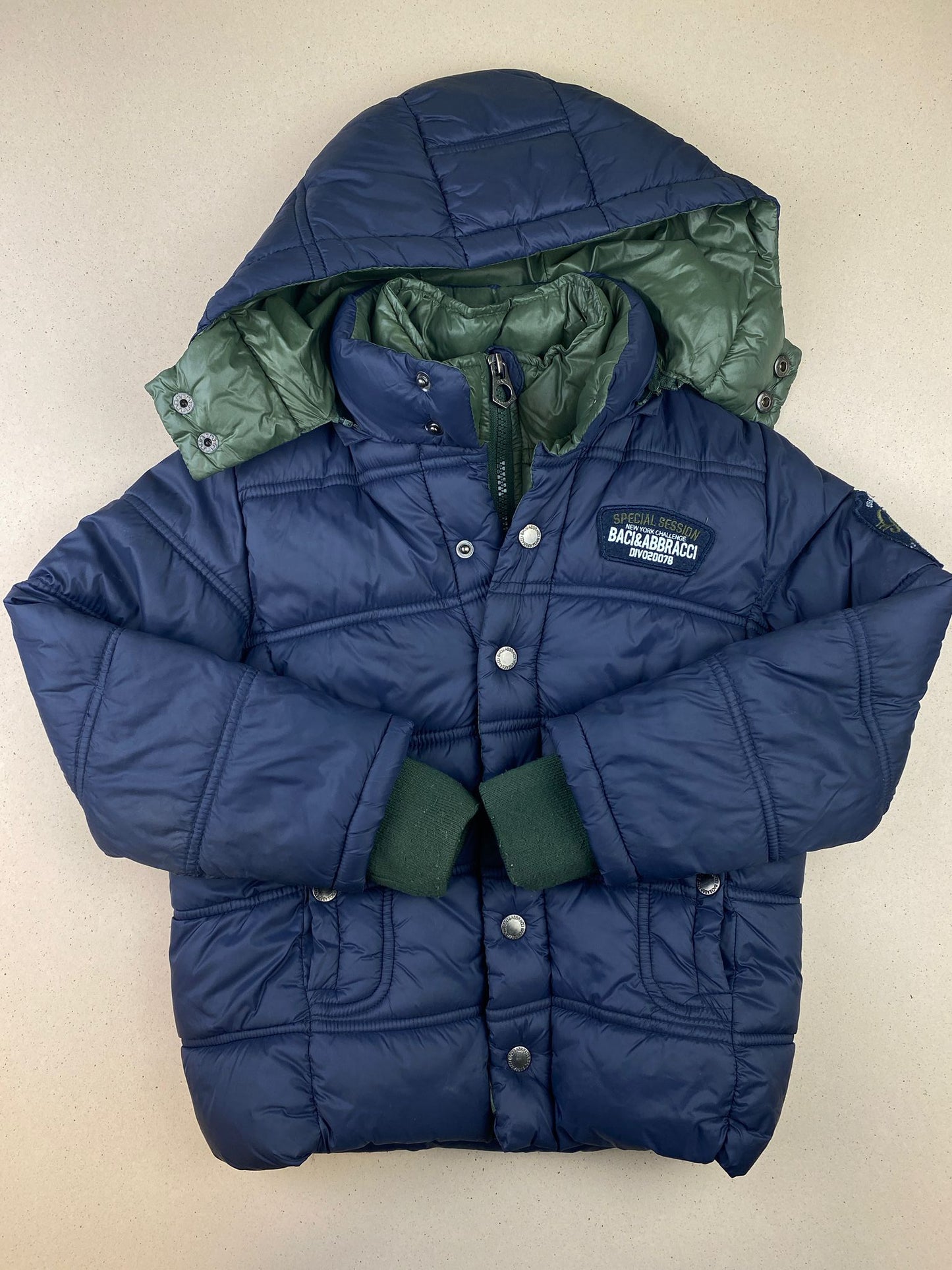 Piumino con cappuccio