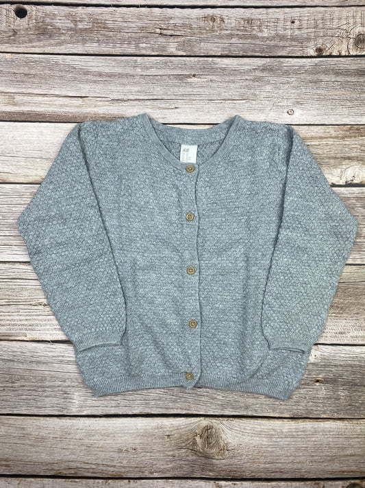 Maglione con bottoncini