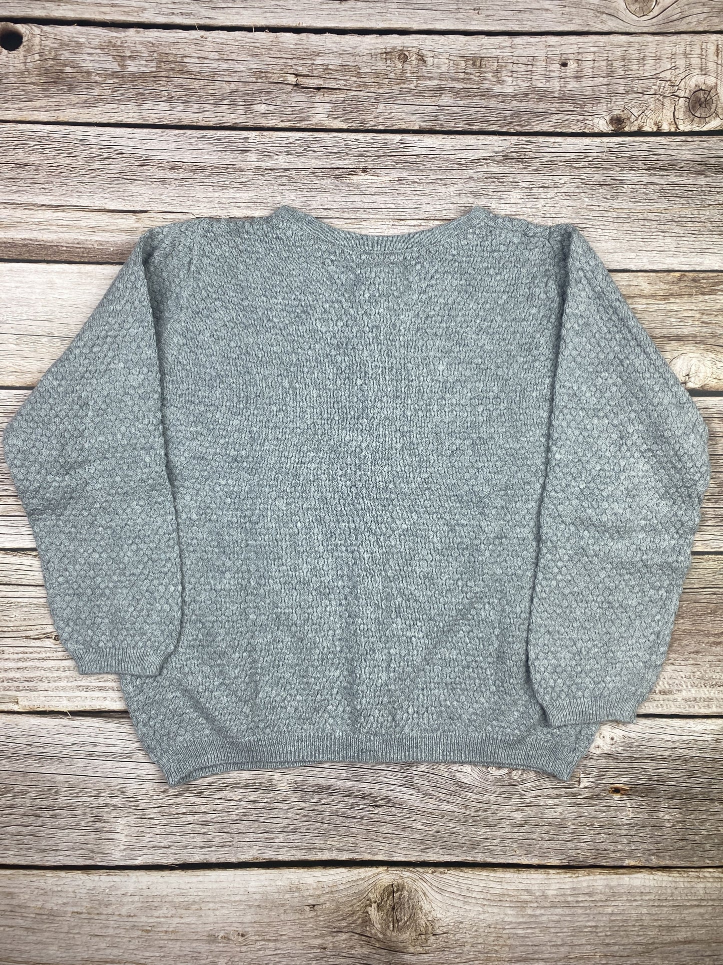 Maglione con bottoncini