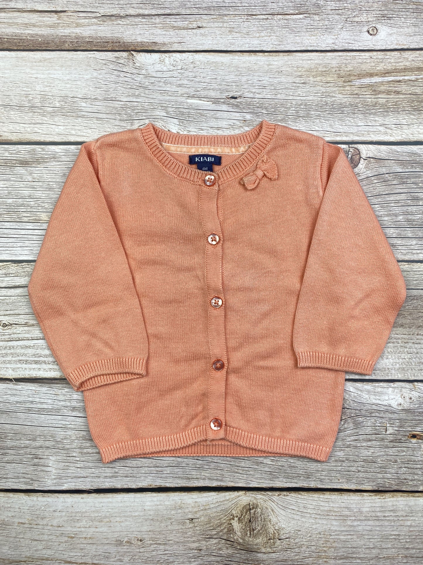 Maglione con bottoncini