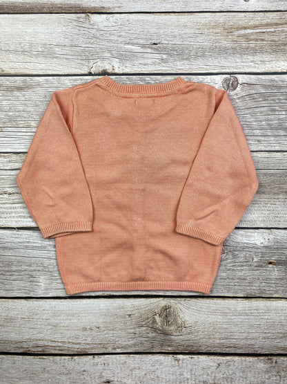 Maglione con bottoncini