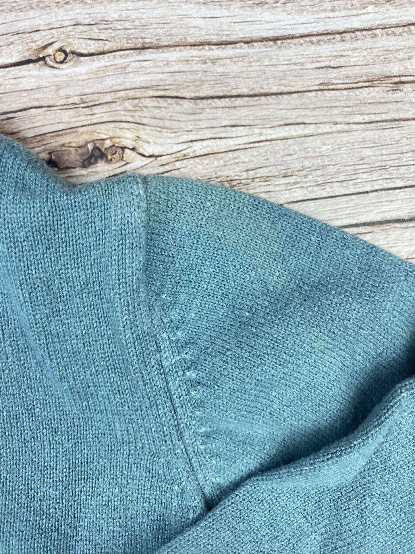 Maglione con bottoncini