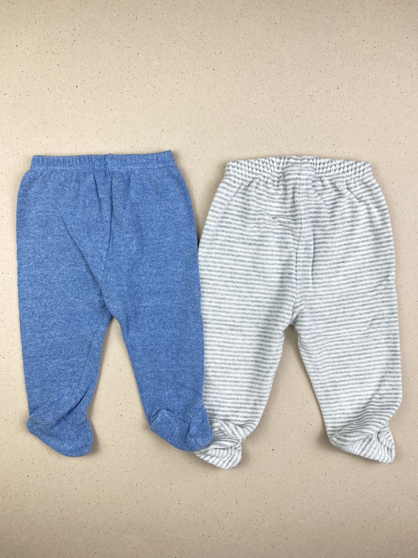 Set tre pantaloni con piedini