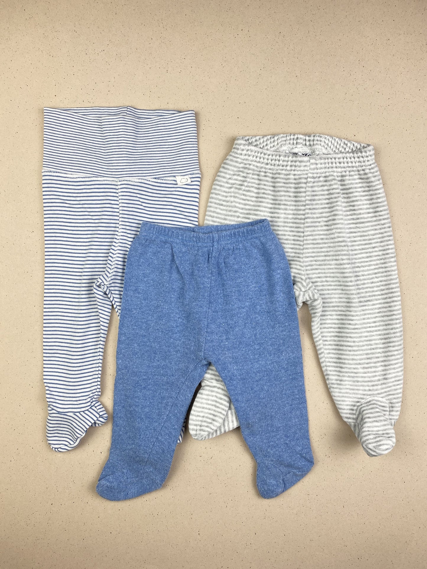 Set tre pantaloni con piedini