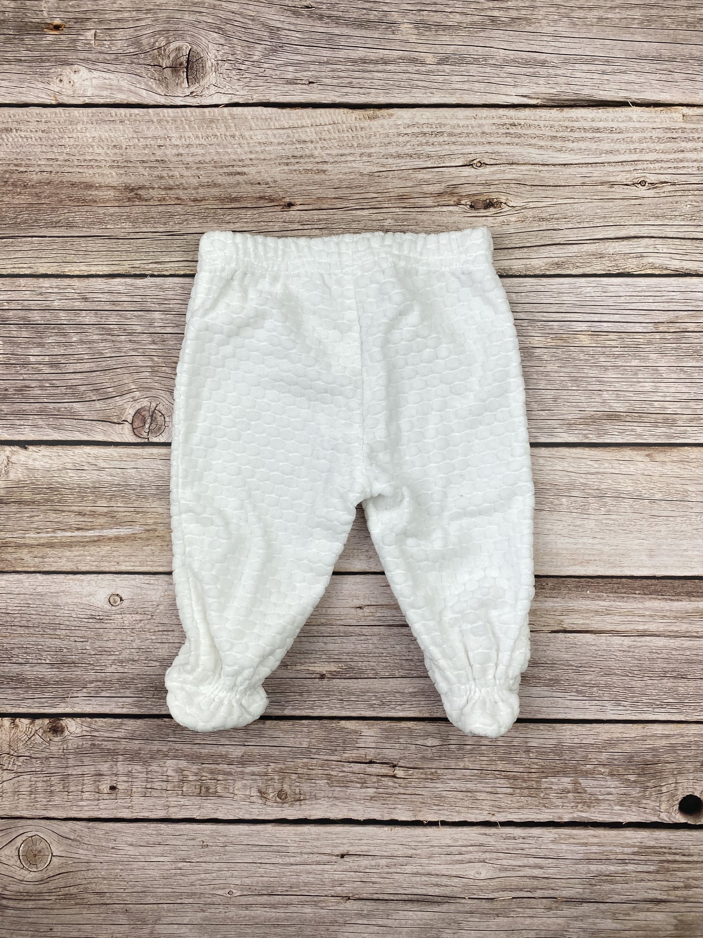 Pantalone con piedini