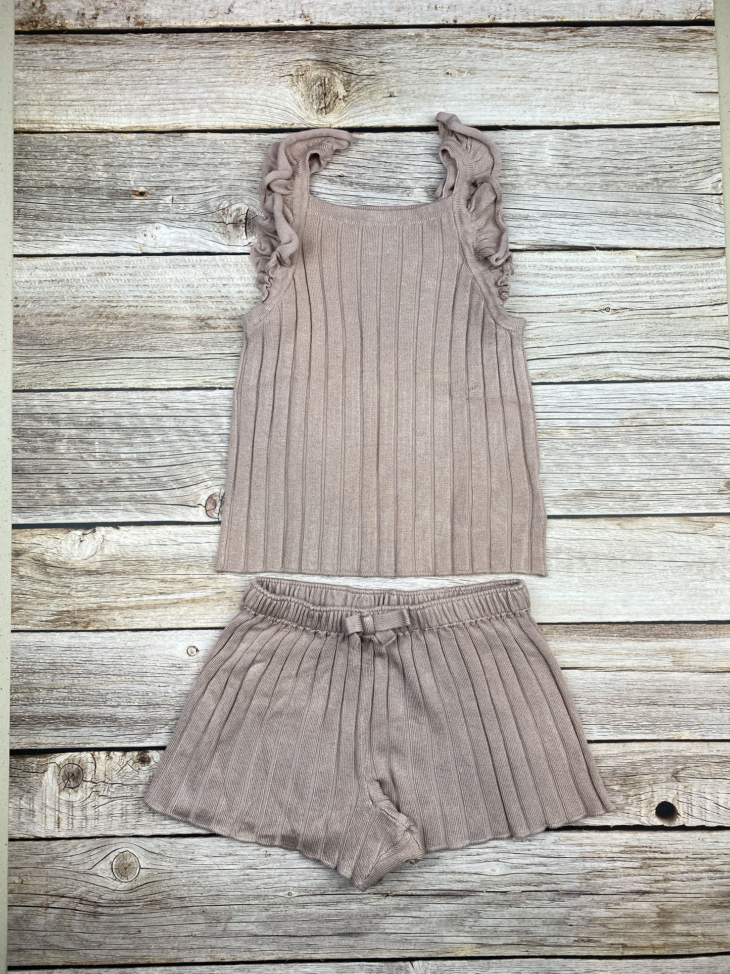 Set T-shirt senza manica e pantaloncino