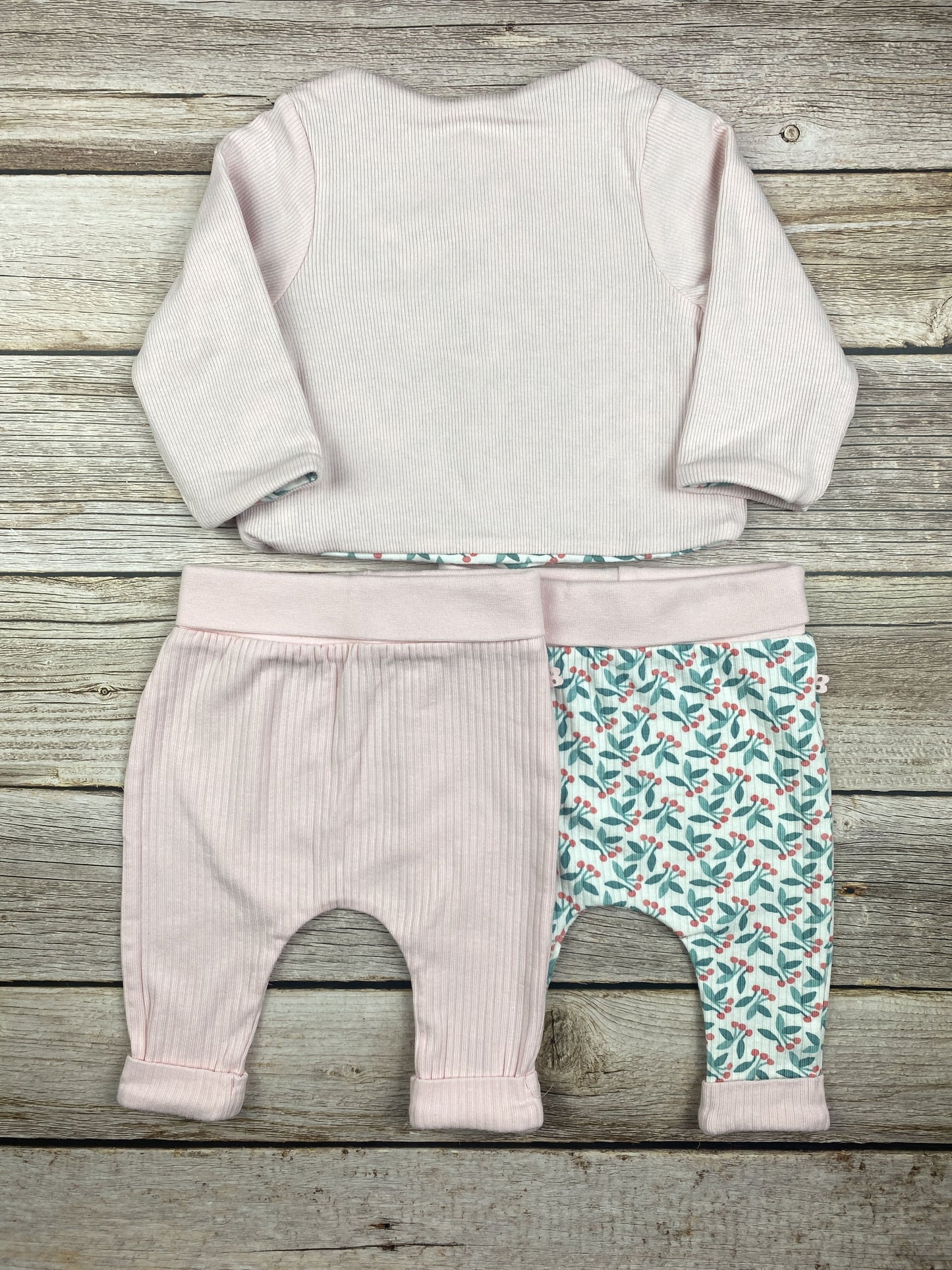 Set felpa reversibile e due pantaloni leggins