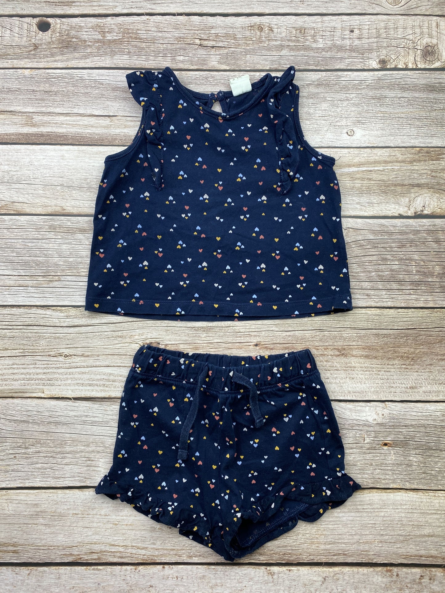 Set t-shirt senza manica e pantaloncino