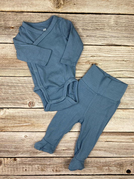 Set body e pantaloni con piedini