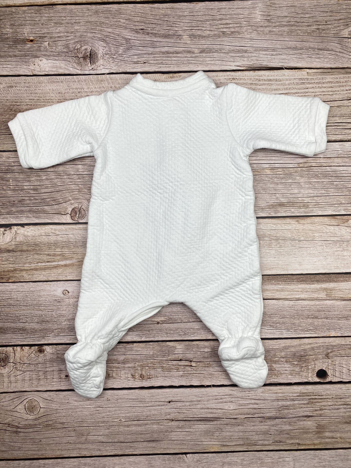 Tutina manica lunga con piedini e zip
