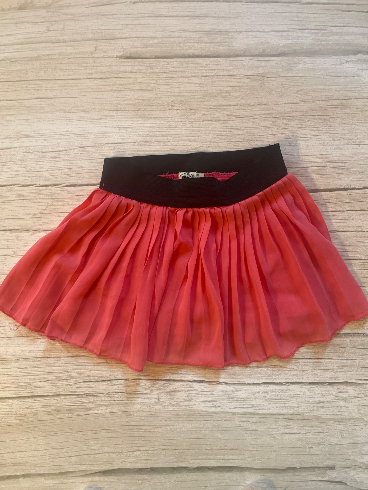 Gonna plissettata rosa con elastico nero