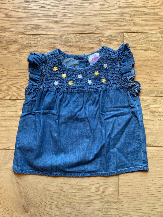 Top in denim con ricamo floreale