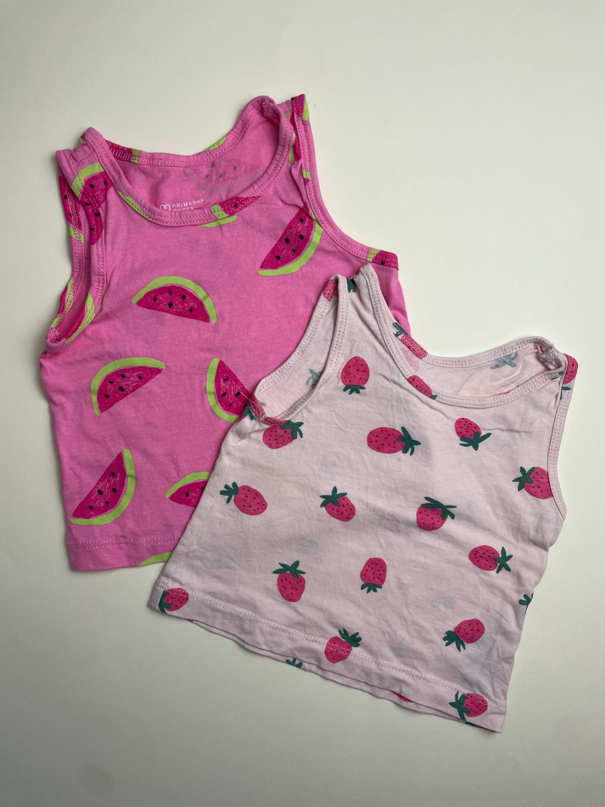 Set di due canotte da bambina con stampe frutta