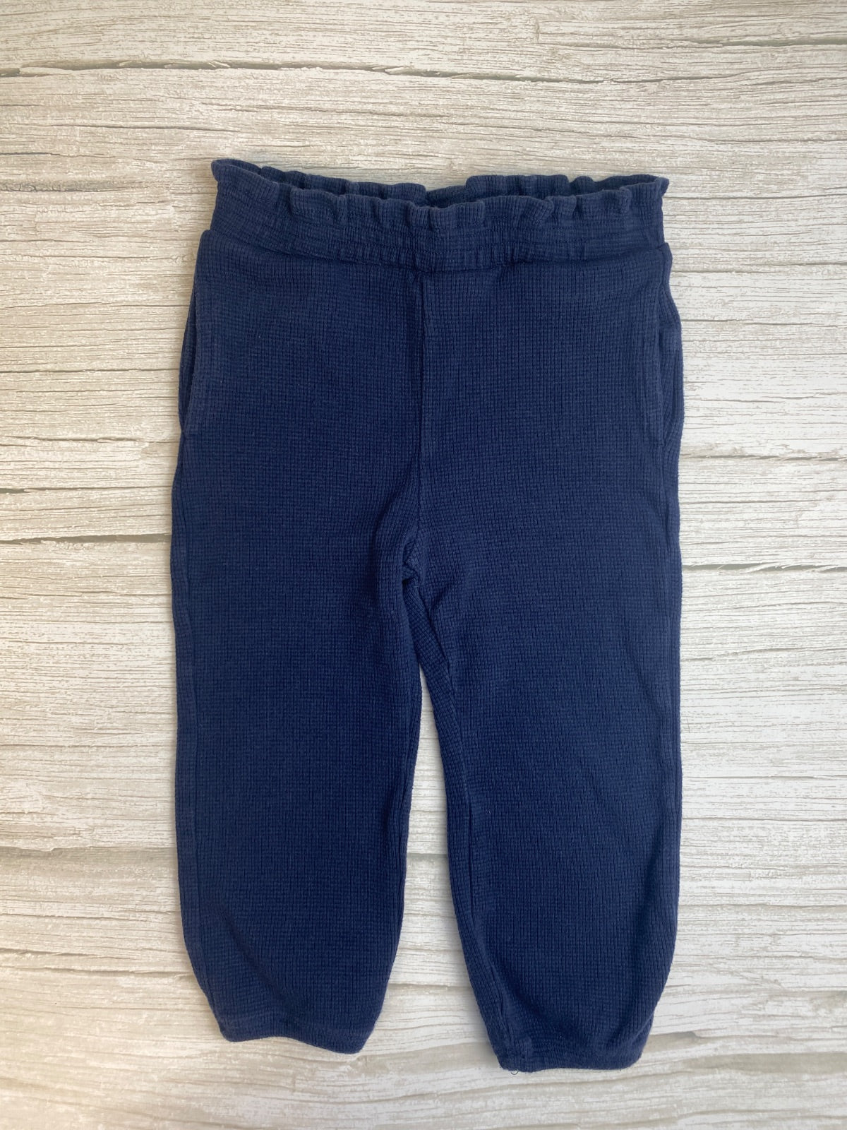 Pantaloni blu scuro in tessuto testurizzato