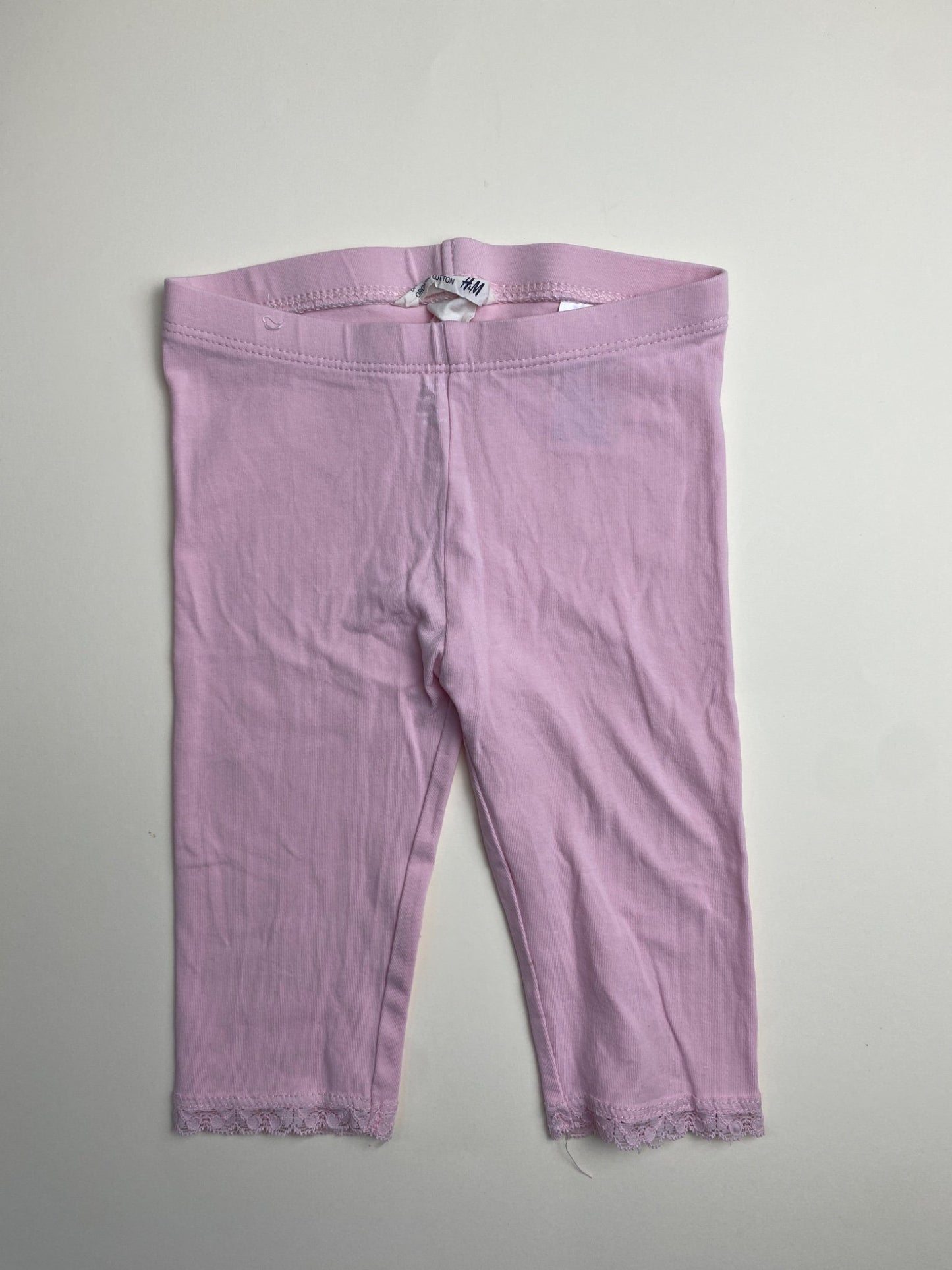 Leggings rosa con pizzo