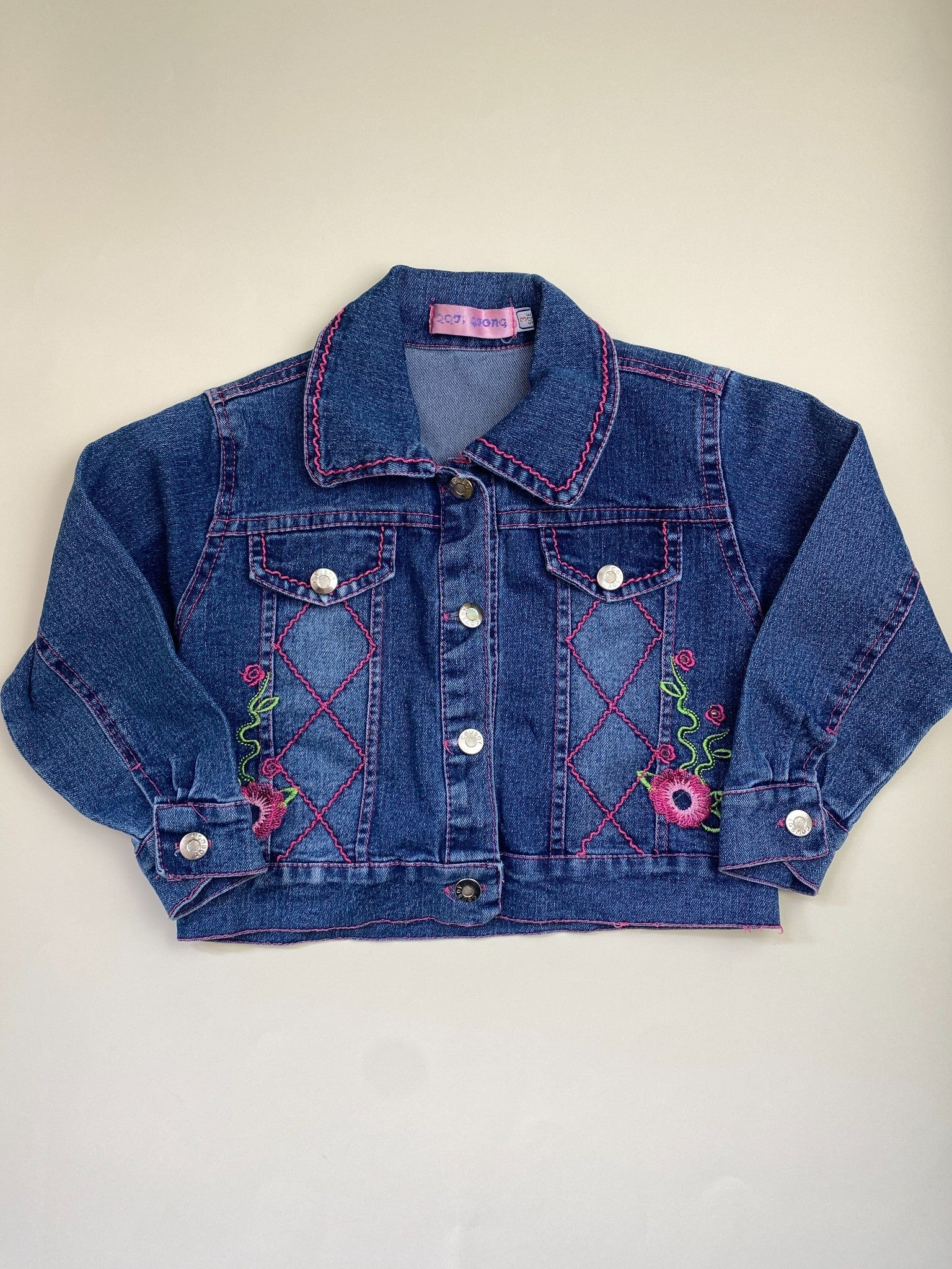 Giacca di jeans per bambina con ricami floreali