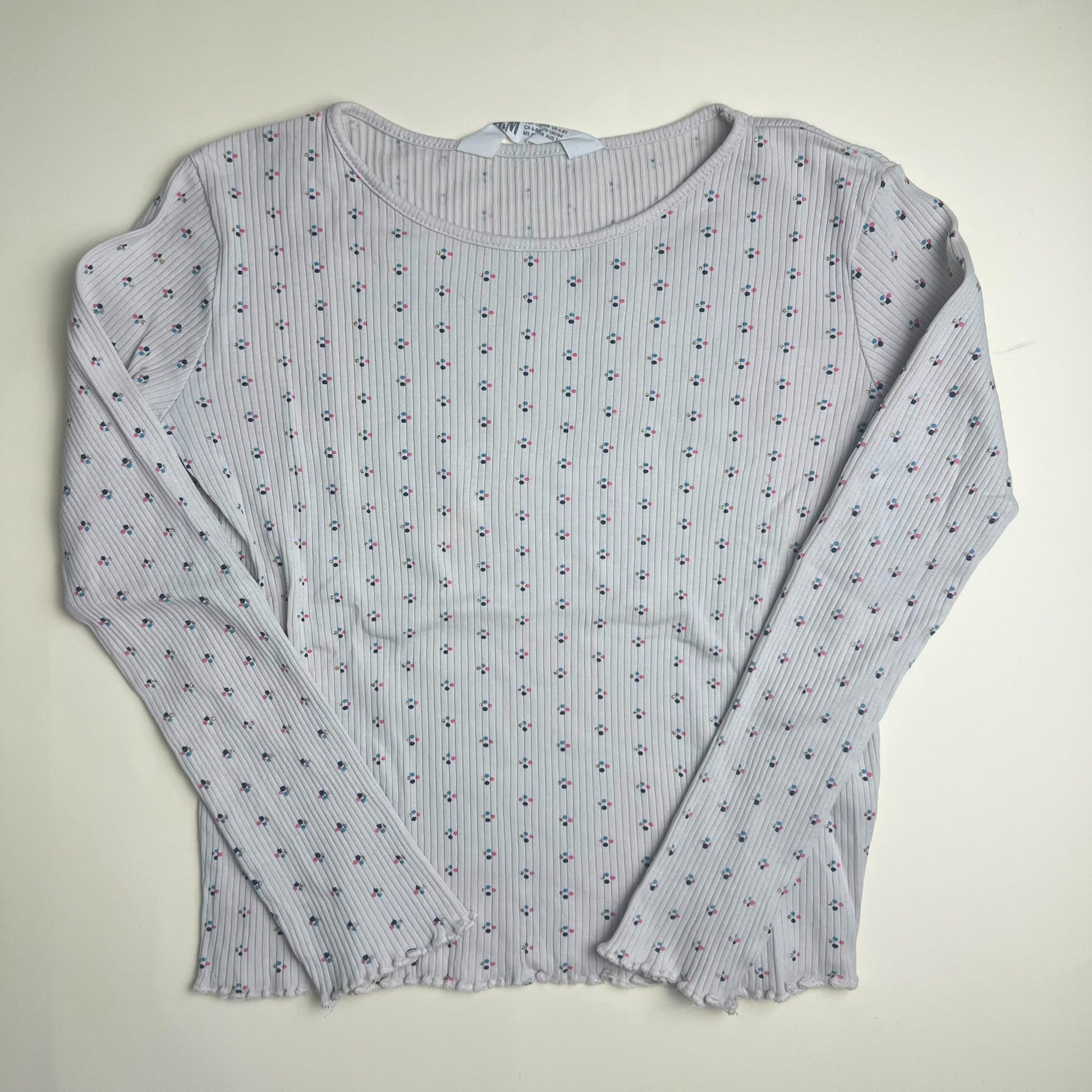 Maglia a maniche lunghe a costine con stampa floreale