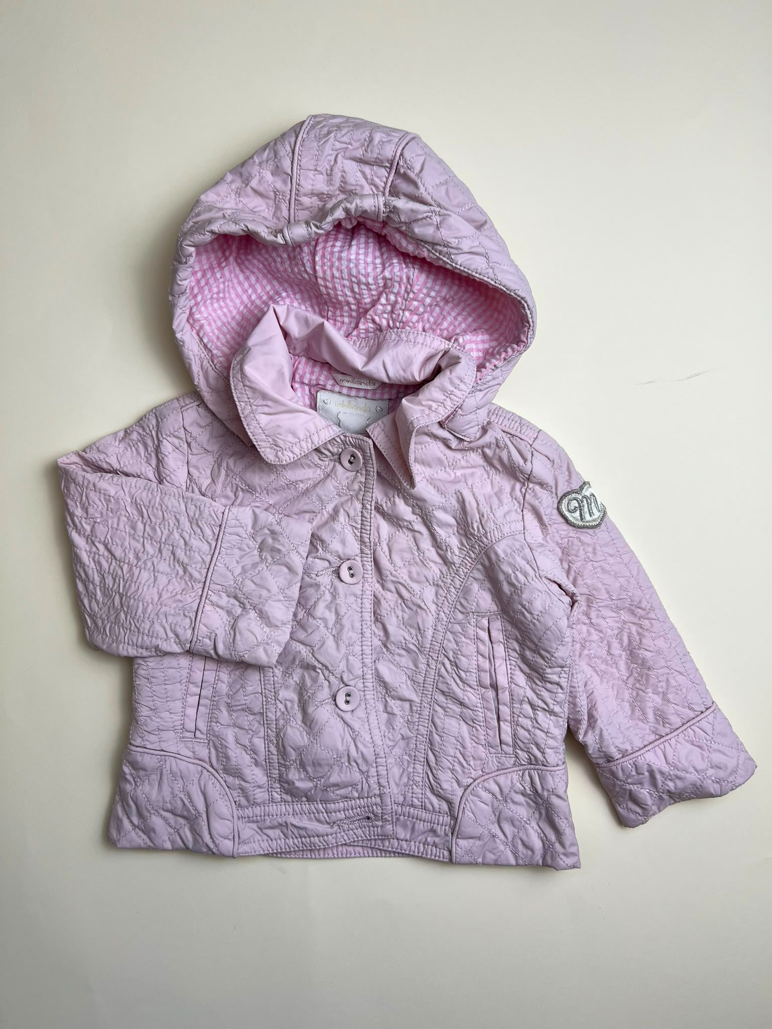 Giacca trapuntata rosa con cappuccio per bambina