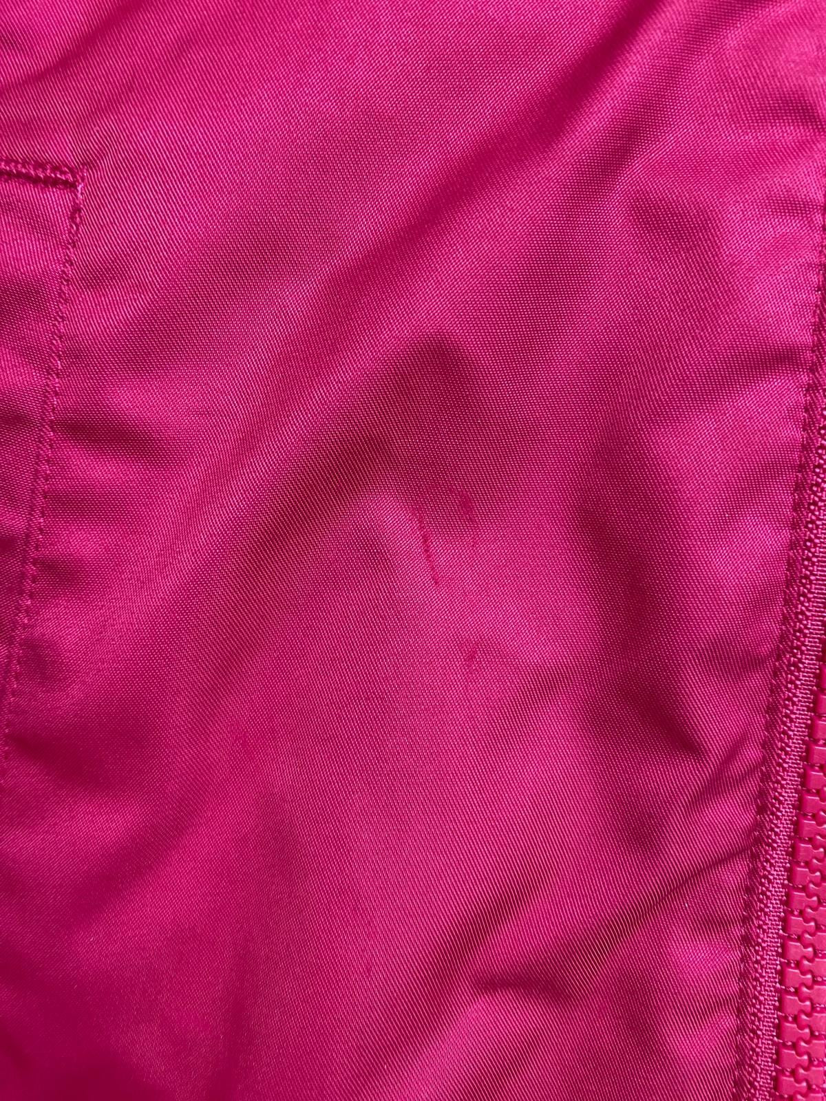 Giacca a vento con cappuccio fucsia per bambini