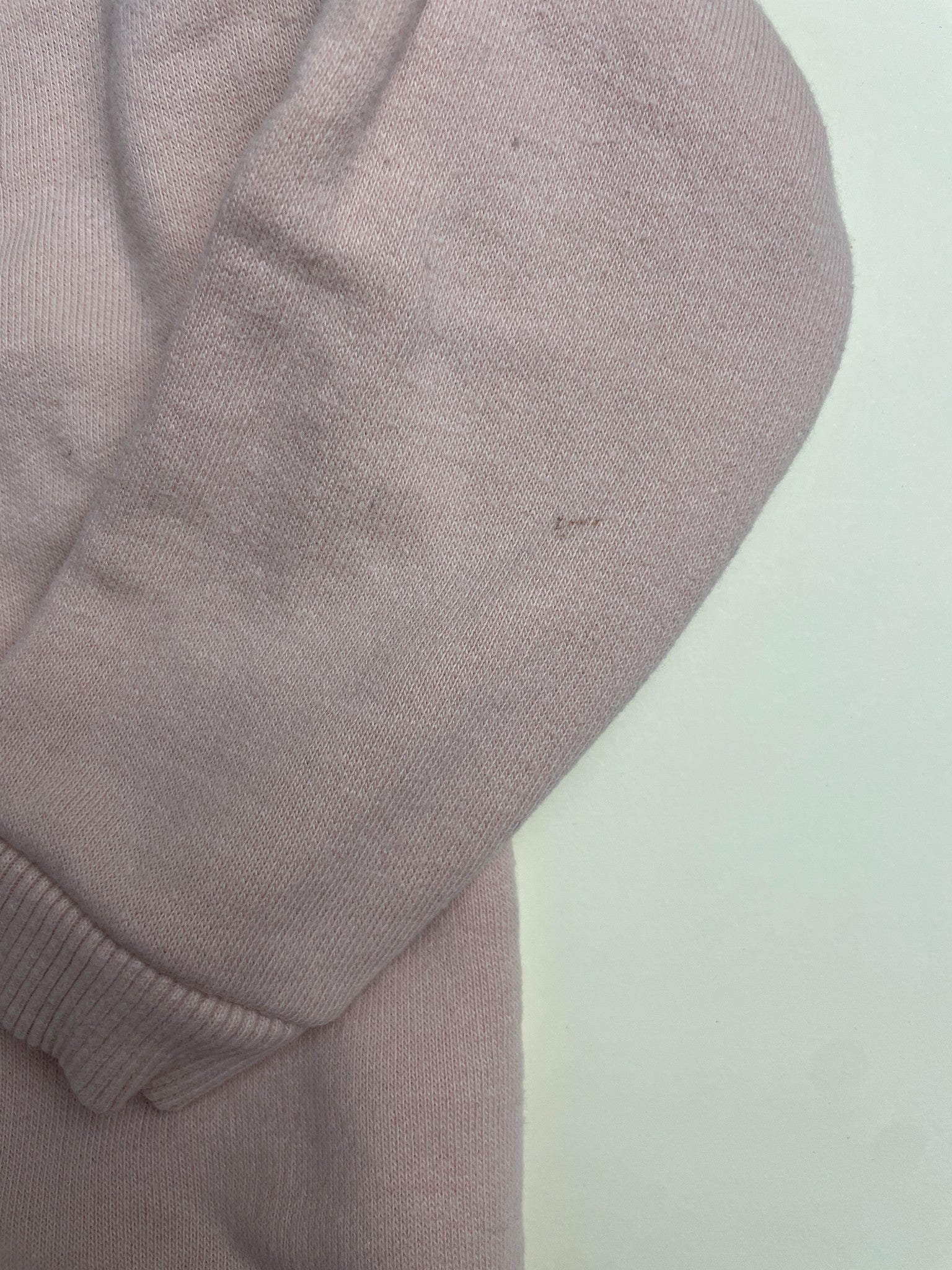 Felpa rosa chiaro con fiocchi sulle spalle