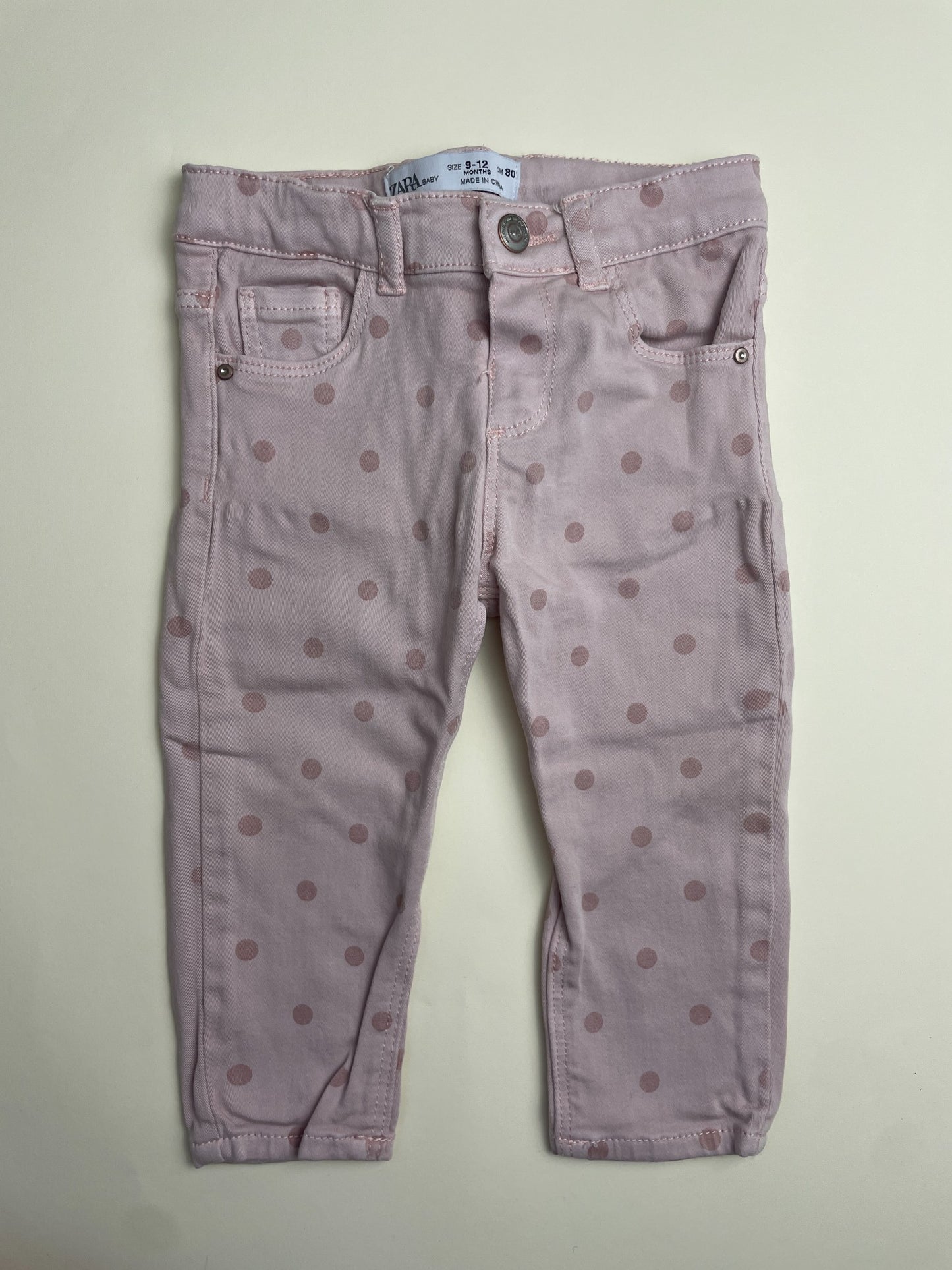 Pantaloni bambina a pois rosa