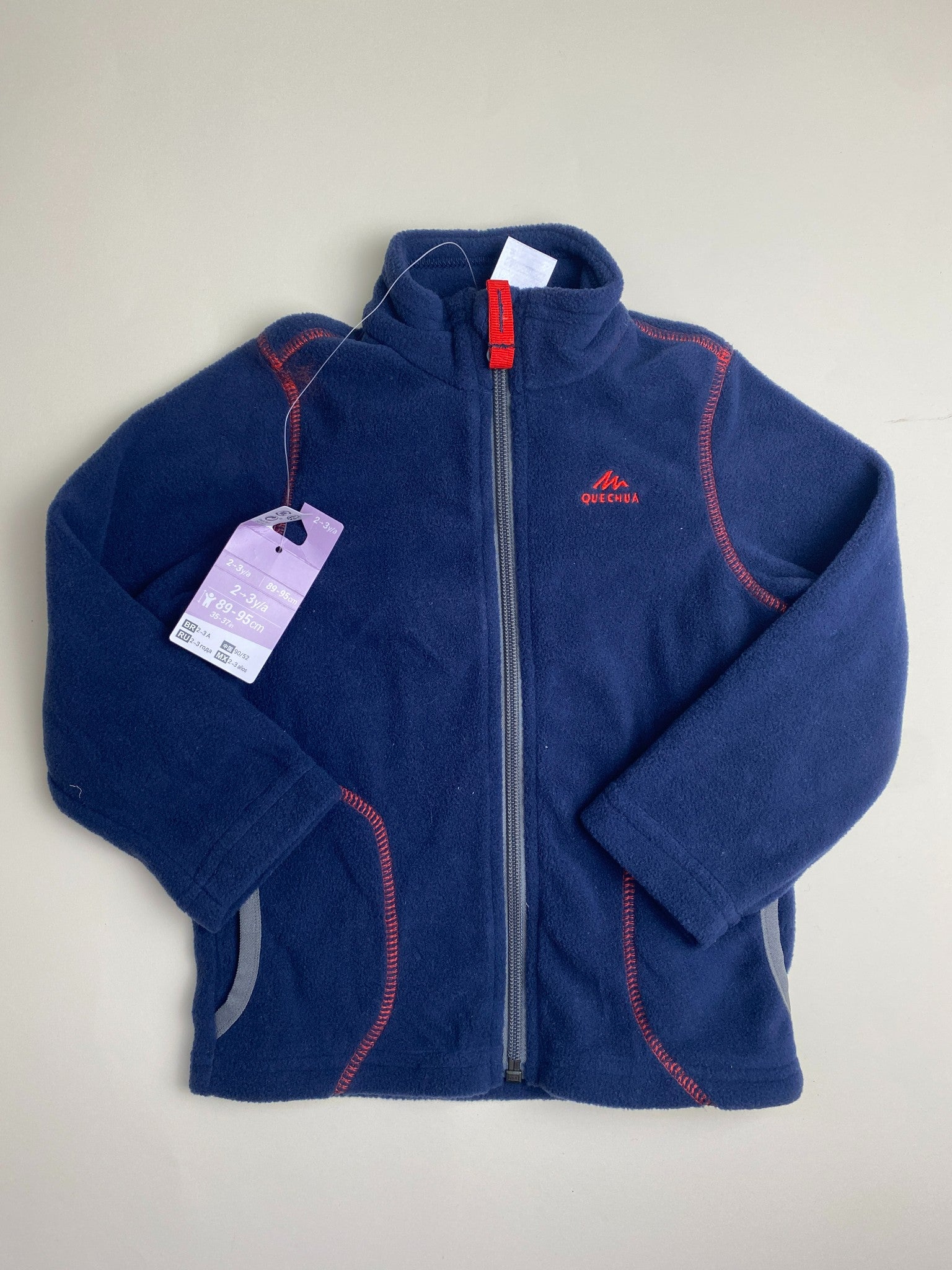 Pile bambino Quechua blu con cerniera